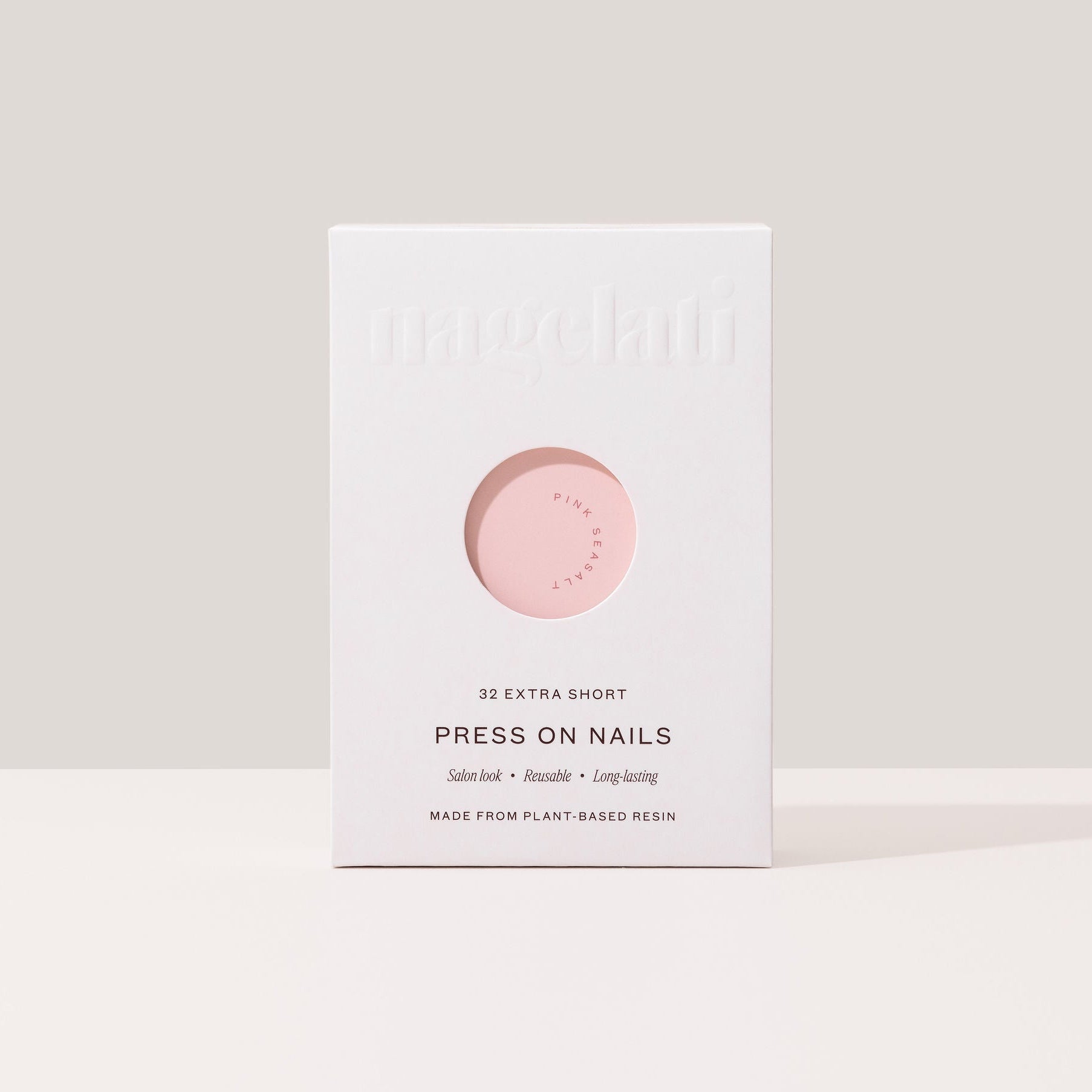 Press-on nails in plastic-free packaging made from FSC-certified paperboard.