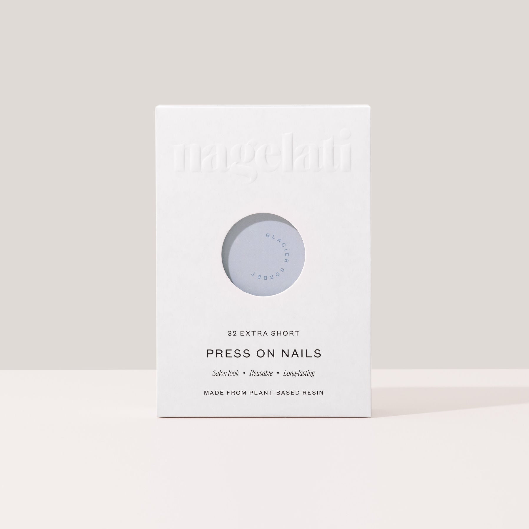 Press-on nails in plastic-free packaging made from FSC-certified paperboard.