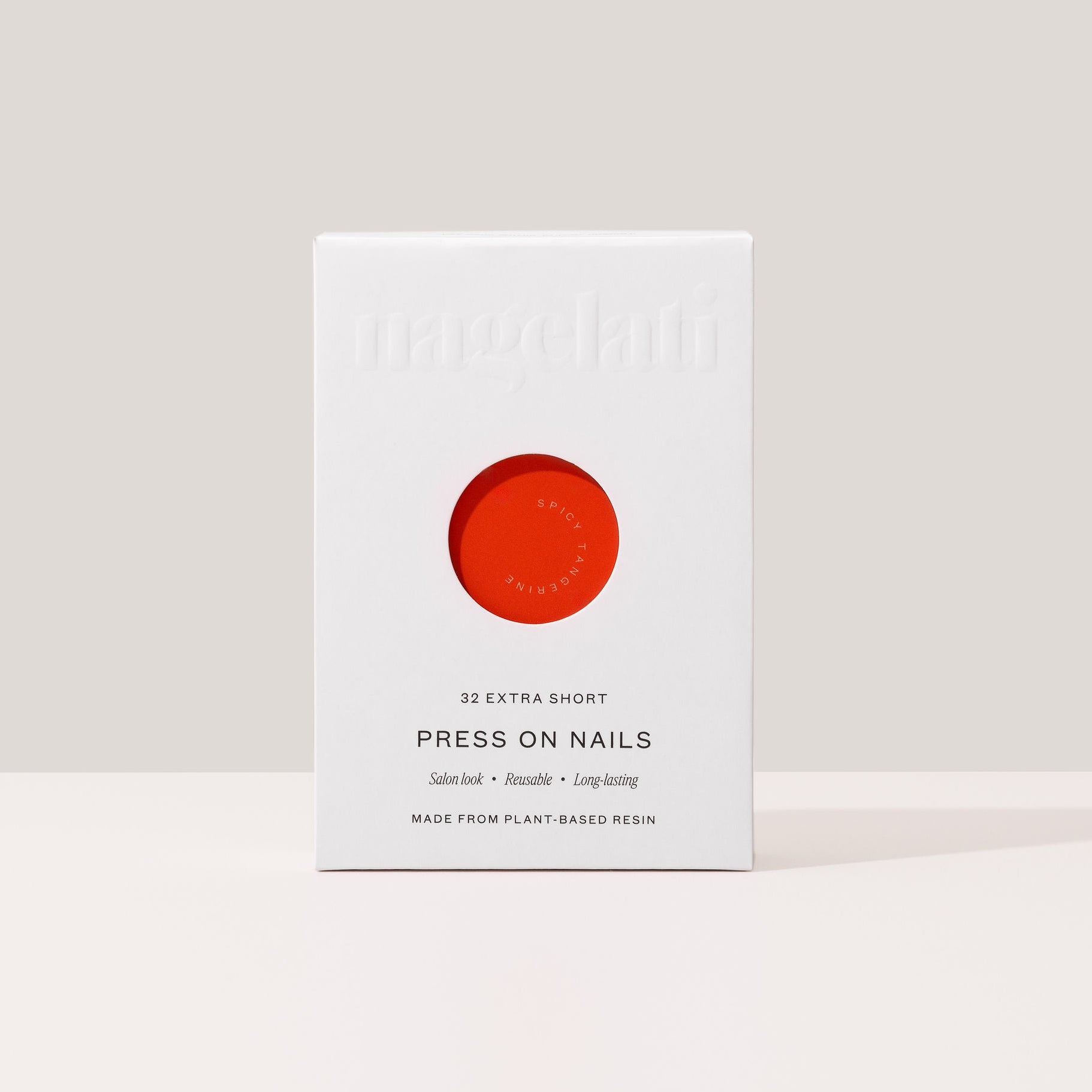 Press-on nails in plastic-free packaging made from FSC-certified paperboard.