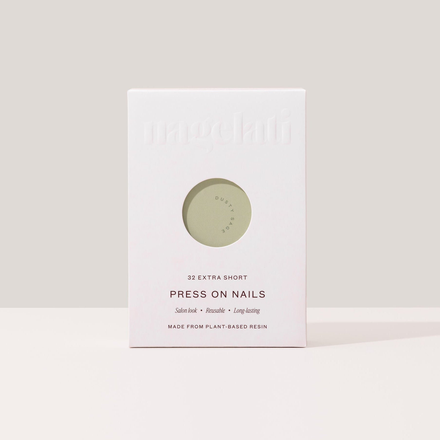 Press-on nails in plastic-free packaging made from FSC-certified paperboard.